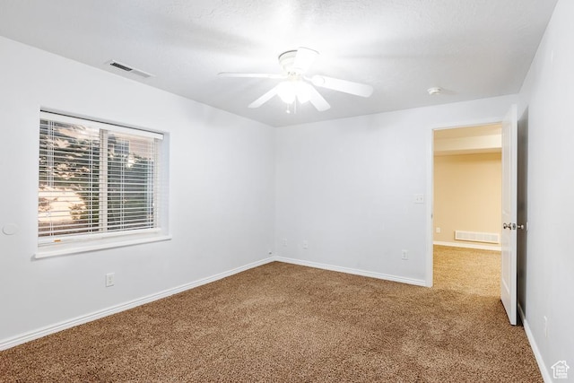 841 E Nichols Canyon Rd, Cedar City, UT 84721 - carpeted empty room featuring visible vents, baseboards, and ceiling fan