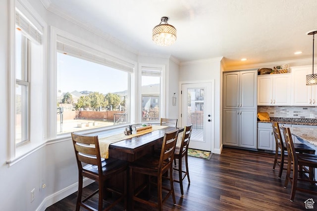 841 E Nichols Canyon Rd, Cedar City, UT 84721 - dining room featuring baseboards, dark wood-type flooring, an inviting chandelier, and crown molding