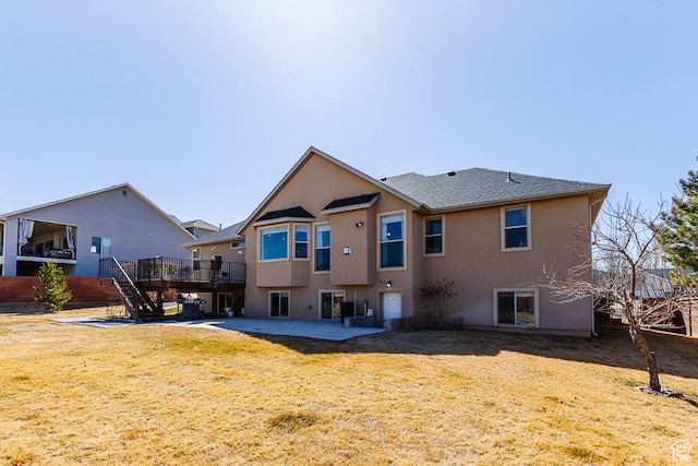 841 E Nichols Canyon Rd, Cedar City, UT 84721 - rear view of property featuring a deck, a patio, stairway, and stucco siding