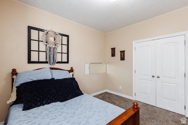 841 E Nichols Canyon Rd, Cedar City, UT 84721 - bedroom with baseboards, carpet floors, a textured ceiling, and a closet