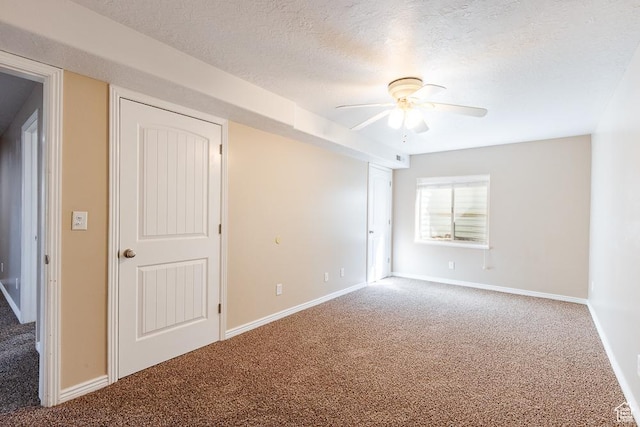 841 E Nichols Canyon Rd, Cedar City, UT 84721 - unfurnished room featuring baseboards, ceiling fan, a textured ceiling, and carpet