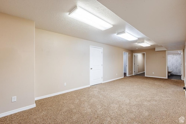 841 E Nichols Canyon Rd, Cedar City, UT 84721 - empty room with baseboards, carpet floors, and a textured ceiling