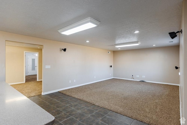 841 E Nichols Canyon Rd, Cedar City, UT 84721 - empty room featuring recessed lighting, dark carpet, a textured ceiling, and baseboards