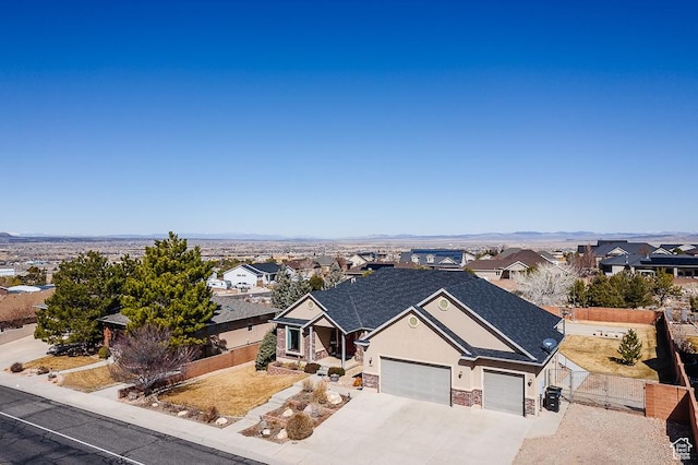 841 E Nichols Canyon Rd, Cedar City, UT 84721 - view of front facade featuring a residential view, stucco siding, and fence
