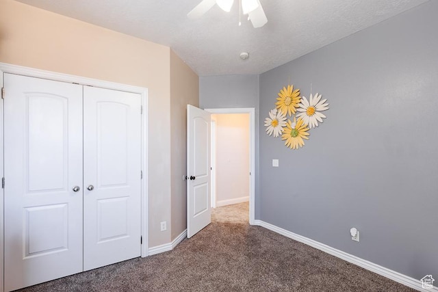 841 E Nichols Canyon Rd, Cedar City, UT 84721 - unfurnished bedroom featuring ceiling fan, baseboards, carpet floors, a closet, and a textured ceiling