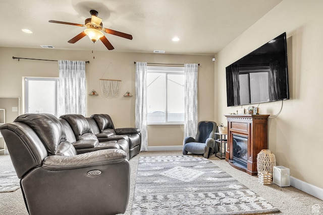 1273 N Baycrest Dr, Saratoga Springs, UT 84045 - living room featuring baseboards, carpet floors, visible vents, and a glass covered fireplace