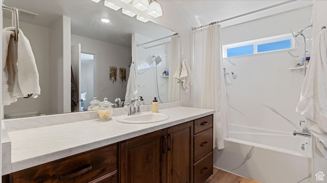 1474 E 480 S, Hyrum, UT 84319 - bathroom with vanity, shower / tub combo with curtain, and wood finished floors