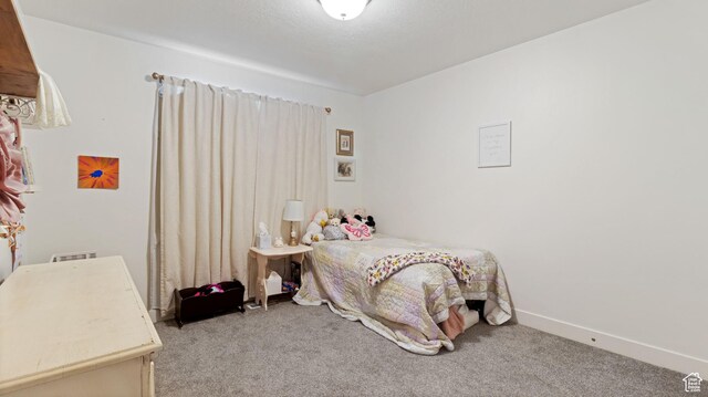 1474 E 480 S, Hyrum, UT 84319 - carpeted bedroom featuring baseboards
