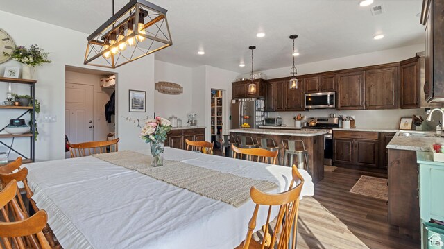 1474 E 480 S, Hyrum, UT 84319 - dining room with recessed lighting, visible vents, dark wood-type flooring, and a toaster