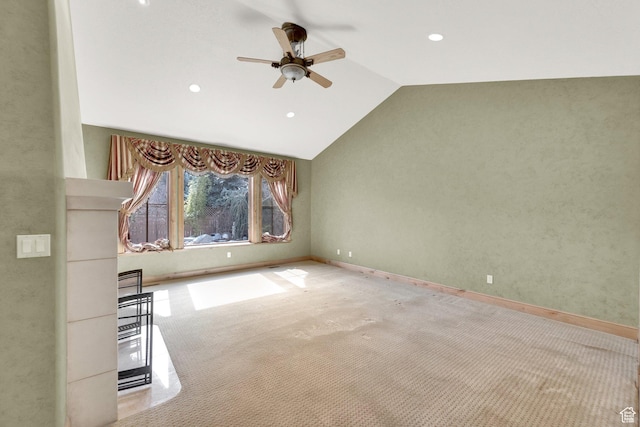 unfurnished living room featuring recessed lighting, ceiling fan, carpet, baseboards, and lofted ceiling