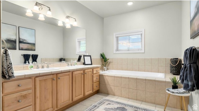 131 W Village Ln, Provo, UT 84604 - bathroom with tile patterned floors, a bath, double vanity, and a sink