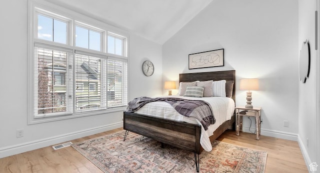 131 W Village Ln, Provo, UT 84604 - bedroom featuring light wood-type flooring, visible vents, baseboards, and high vaulted ceiling