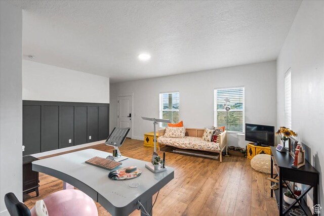 10757 S Lamond Dr, South Jordan, UT 84009 - living area with light wood finished floors and a textured ceiling