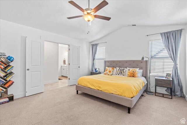 10757 S Lamond Dr, South Jordan, UT 84009 - bedroom featuring multiple windows, lofted ceiling, light carpet, connected bathroom, and a ceiling fan