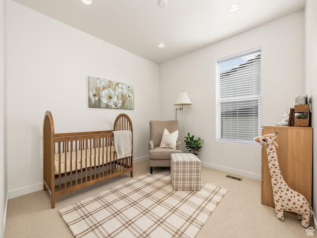 bedroom with visible vents, recessed lighting, carpet, and baseboards