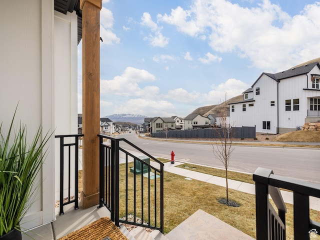balcony featuring a residential view