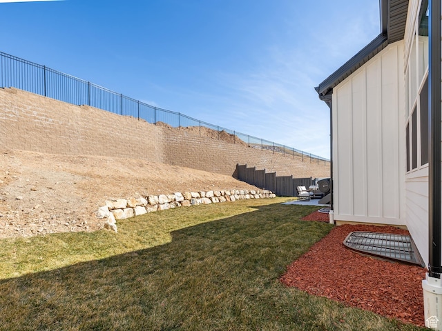 view of yard with a patio and a fenced backyard