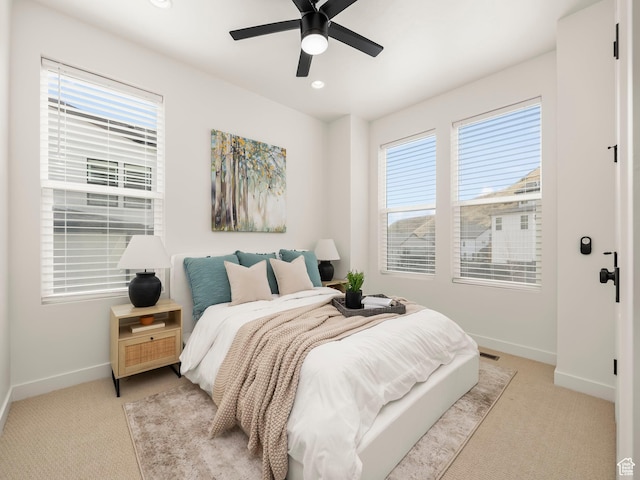 bedroom featuring recessed lighting, baseboards, light carpet, and ceiling fan