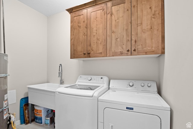 1984 S 4300 W, Ogden, UT 84401 - clothes washing area featuring cabinet space and independent washer and dryer