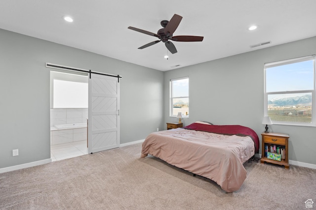 1984 S 4300 W, Ogden, UT 84401 - carpeted bedroom with visible vents, baseboards, a barn door, recessed lighting, and connected bathroom