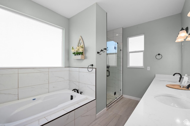 1984 S 4300 W, Ogden, UT 84401 - full bath with a sink, a bath, a stall shower, and baseboards