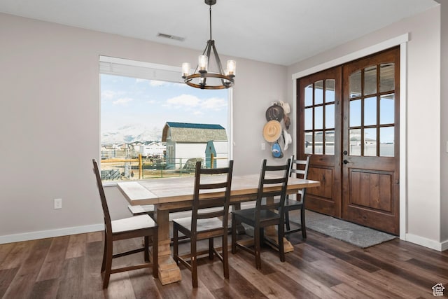 1984 S 4300 W, Ogden, UT 84401 - dining room featuring an inviting chandelier, baseboards, dark wood finished floors, and visible vents