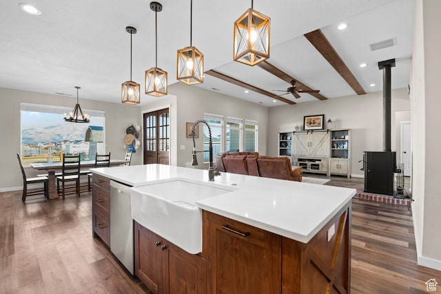 1984 S 4300 W, Ogden, UT 84401 - kitchen featuring a sink, dark wood-style flooring, light countertops, recessed lighting, and stainless steel dishwasher