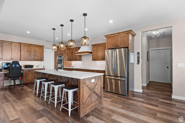 1984 S 4300 W, Ogden, UT 84401 - kitchen featuring recessed lighting, an island with sink, dark wood-style floors, light countertops, and appliances with stainless steel finishes