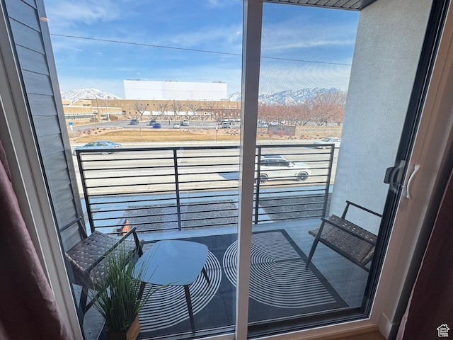 balcony featuring a mountain view