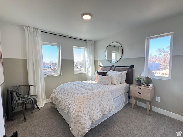 carpeted bedroom with baseboards
