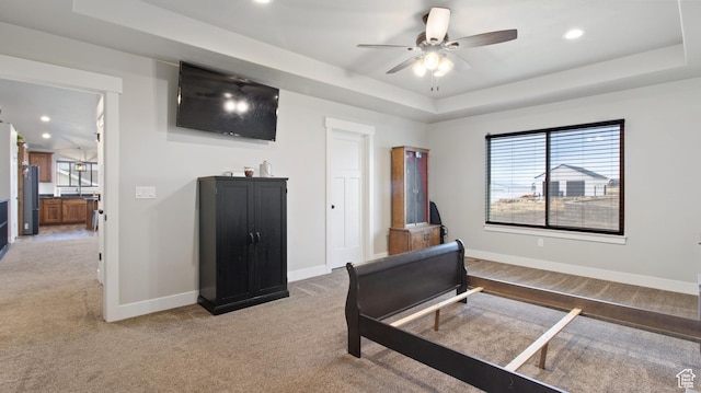 1081 N 2800 W, Tremonton, UT 84337 - bedroom featuring baseboards, recessed lighting, freestanding refrigerator, light carpet, and a raised ceiling