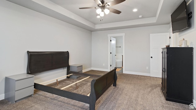 1081 N 2800 W, Tremonton, UT 84337 - bedroom featuring a ceiling fan, carpet, baseboards, a raised ceiling, and connected bathroom