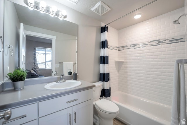 4726 W Plainfield Rd S, Herriman, UT 84096 - bathroom with visible vents, vanity, toilet, and shower / tub combo with curtain