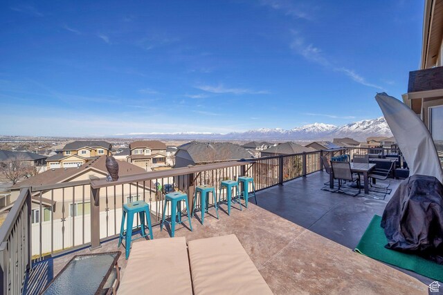 4726 W Plainfield Rd S, Herriman, UT 84096 - view of patio with a balcony, a mountain view, outdoor dining area, and a residential view