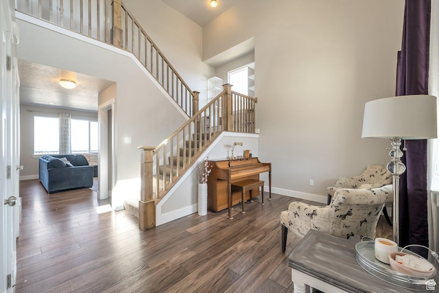 4726 W Plainfield Rd S, Herriman, UT 84096 - interior space with stairway, baseboards, a high ceiling, and wood finished floors