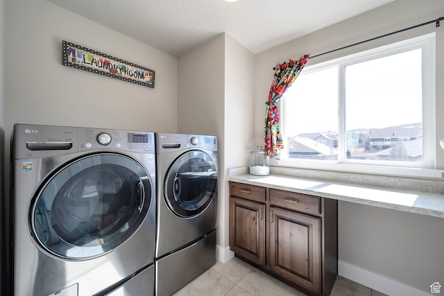 4726 W Plainfield Rd S, Herriman, UT 84096 - laundry area featuring light tile patterned floors and washer and clothes dryer