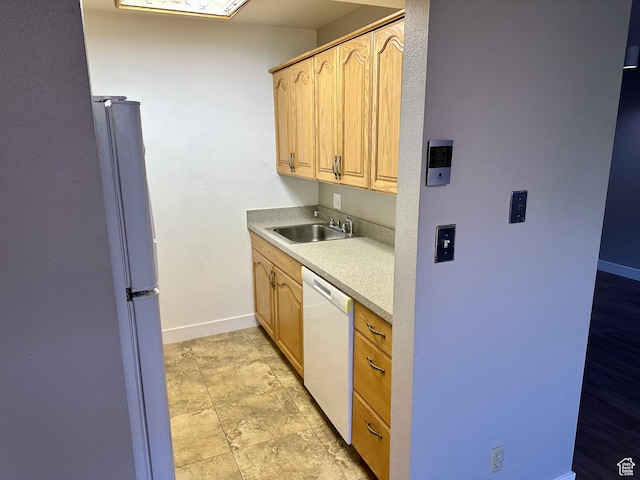 1170 S Foothill Dr Unit 311, Salt Lake City, UT 84108 - kitchen featuring white appliances, light countertops, and light brown cabinets