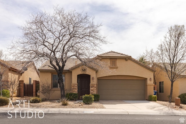 mediterranean / spanish-style house featuring a tile roof, driveway, stucco siding, fence, and a garage