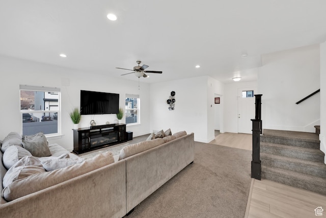 1373 E Bell Buoy Way S, Eagle Mountain, UT 84005 - living room featuring light wood finished floors, stairway, recessed lighting, and ceiling fan