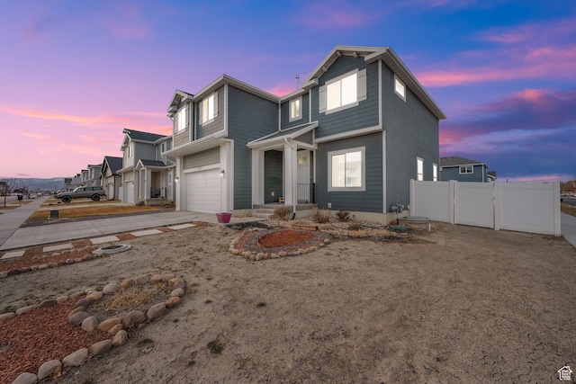 1373 E Bell Buoy Way S, Eagle Mountain, UT 84005 - traditional-style home with a gate, a garage, driveway, and fence