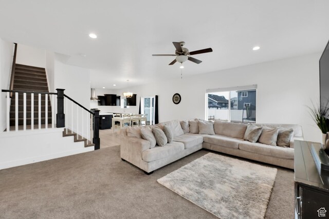 1373 E Bell Buoy Way S, Eagle Mountain, UT 84005 - carpeted living room with a ceiling fan, stairway, recessed lighting, and baseboards