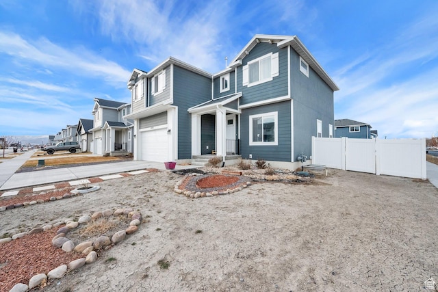 1373 E Bell Buoy Way S, Eagle Mountain, UT 84005 - view of front of property featuring a garage, driveway, and fence
