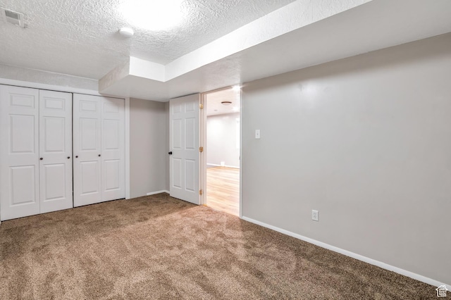 1354 N 2950 W, Clinton, UT 84015 - below grade area with carpet flooring, baseboards, visible vents, and a textured ceiling