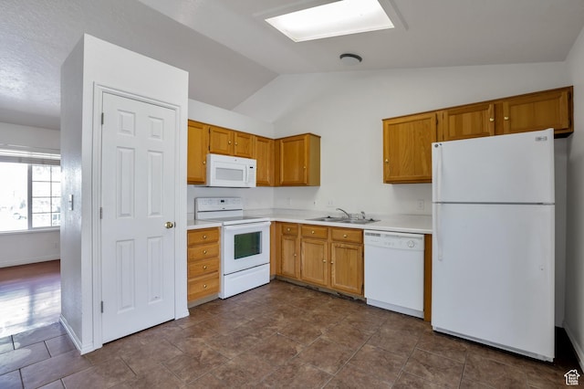 1354 N 2950 W, Clinton, UT 84015 - kitchen with white appliances, baseboards, a sink, light countertops, and vaulted ceiling