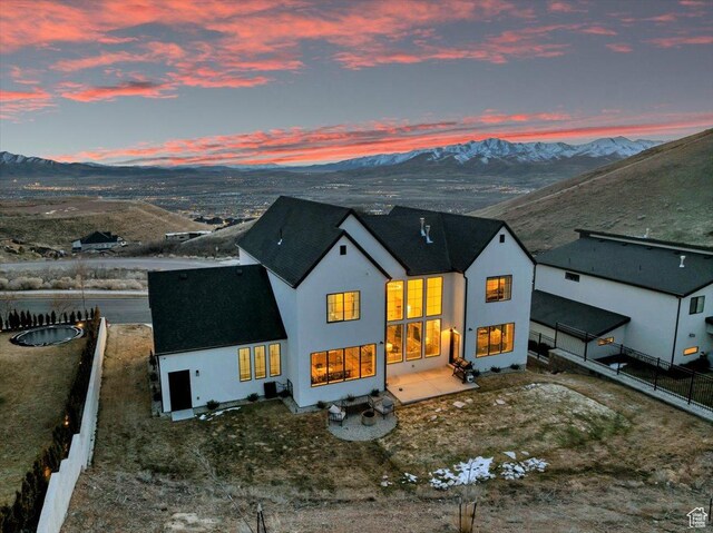 4875 N Vialetto Way, Lehi, UT 84043 - back of house with stucco siding, a mountain view, and fence