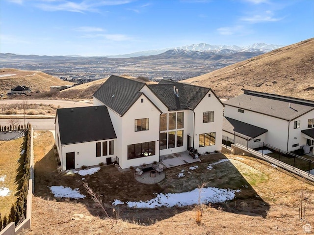 4875 N Vialetto Way, Lehi, UT 84043 - rear view of property with stucco siding, a mountain view, and a fenced backyard