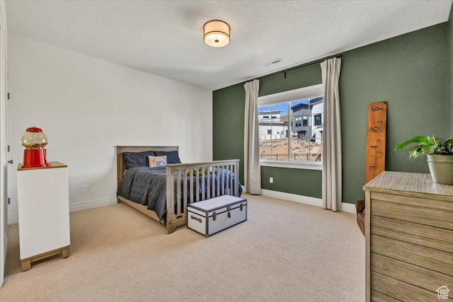 4875 N Vialetto Way, Lehi, UT 84043 - bedroom with visible vents, baseboards, light colored carpet, and a textured ceiling