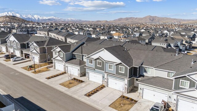 4905 E Lake Corner Dr, Eagle Mountain, UT 84005 - drone / aerial view with a residential view and a mountain view