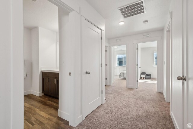 4905 E Lake Corner Dr, Eagle Mountain, UT 84005 - corridor with visible vents, baseboards, and carpet flooring
