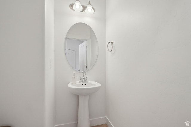 4905 E Lake Corner Dr, Eagle Mountain, UT 84005 - bathroom featuring baseboards